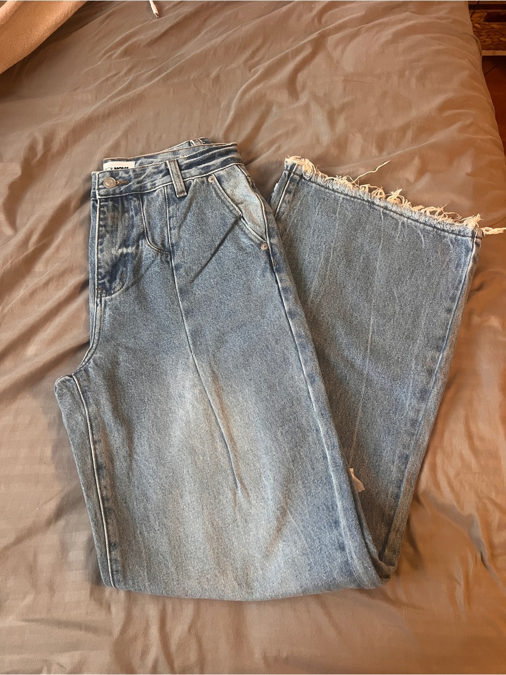 High-Rise Light Blue Frayed Hem Jeans